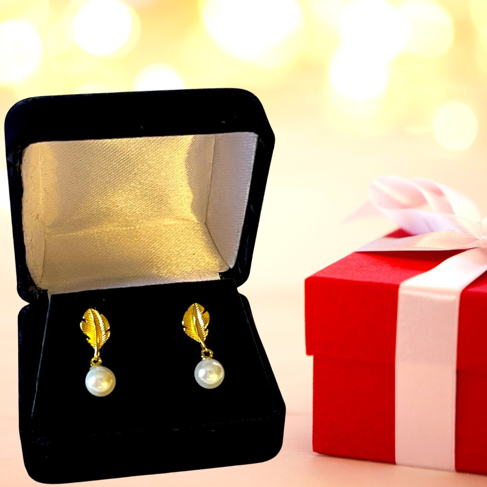 Gold feather and pearl earrings